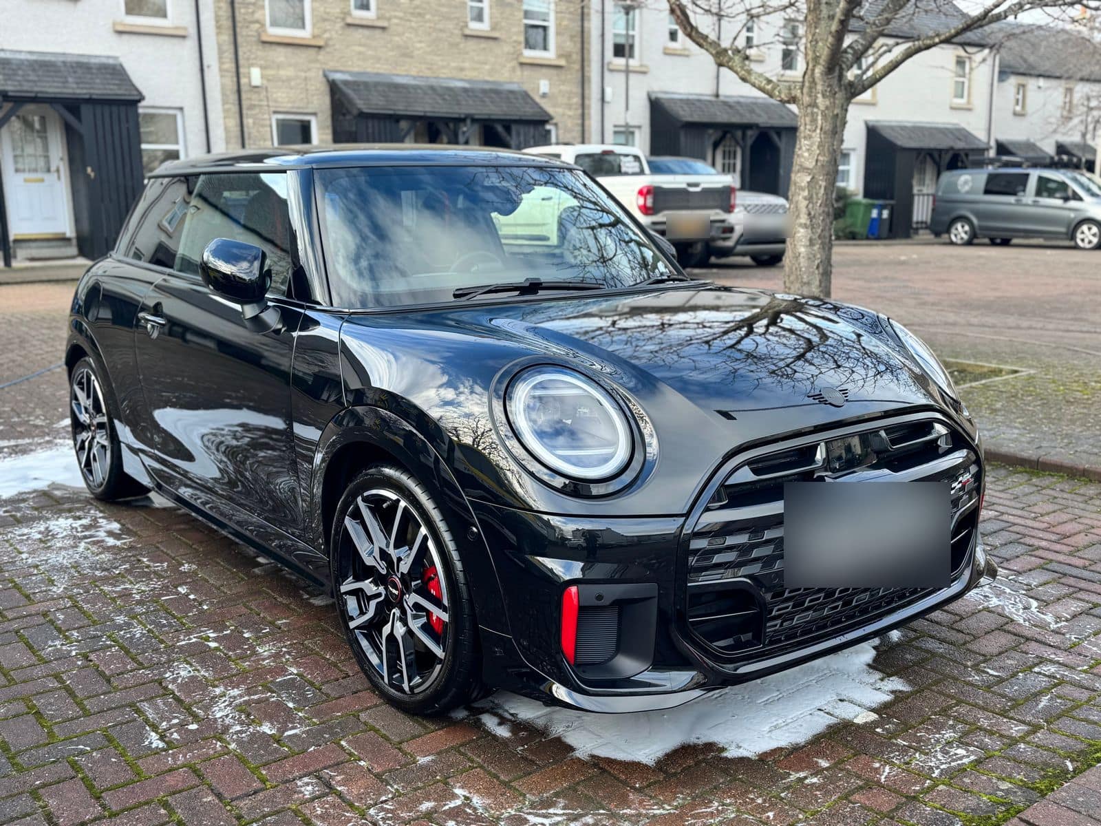 After: the same Mini in deep, glossy black